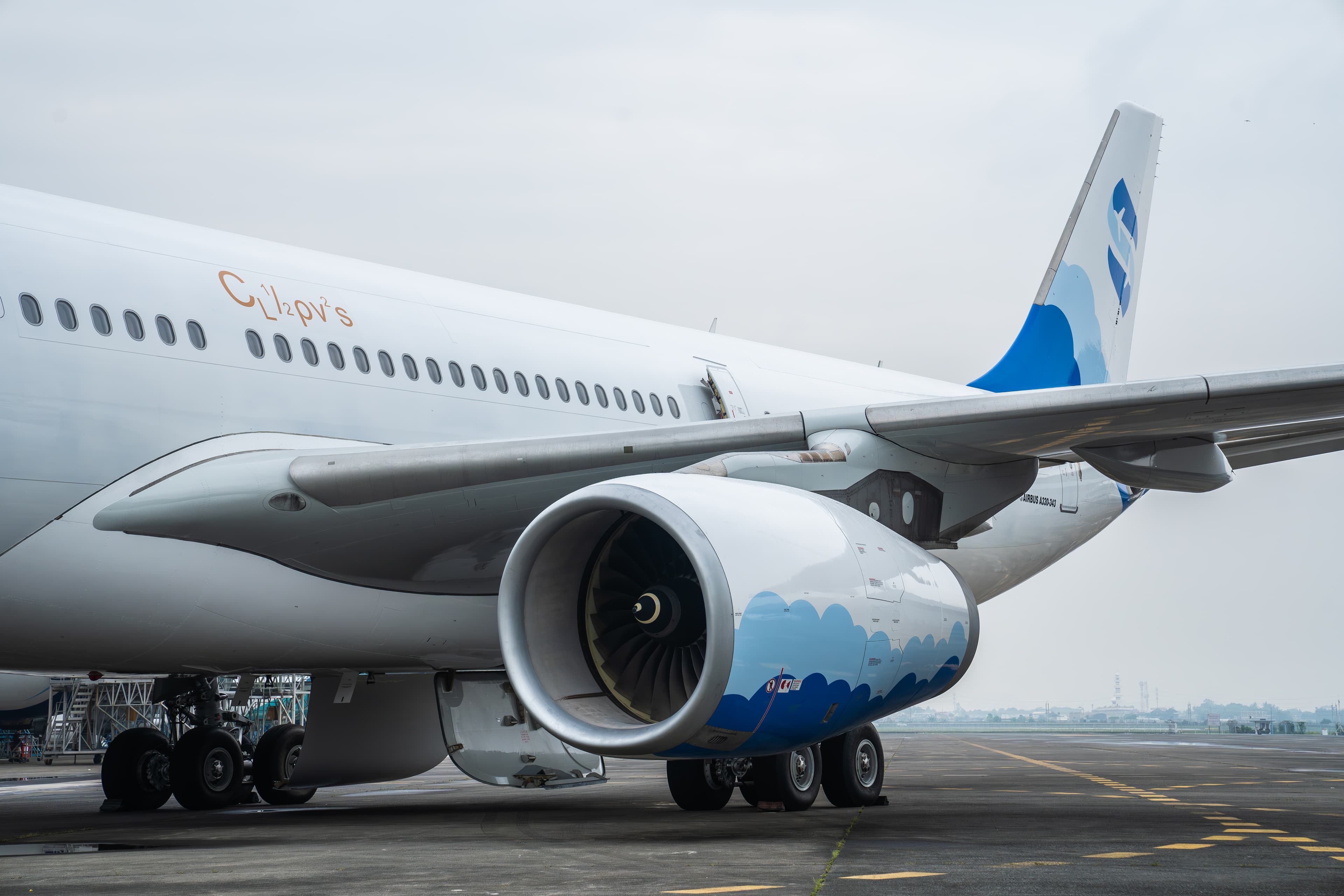 Rolls-Royce Trent 772B engine wrapped in the blue cloud livery of an SMEA Airbus A330-300